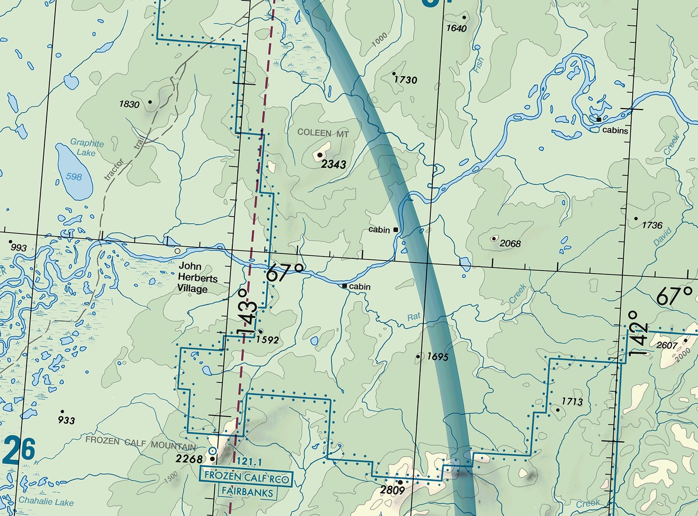 Sectional chart excerpt of interior Alaska near Coleen Mountain. A broad blue band curves from the top edge of the frame down to the bottom edge, right of center. The band fades out along its west side and is dense along its east side. Terrain contours, streams, and spot elevations cover the ground on both sides of it, including Coleen Mountain at 2343 feet.