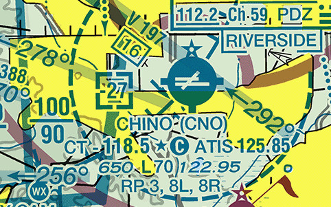 A sectional chart excerpt centered on Chino Airport, drawn as a filled dark blue circle carrying two crossing white runway lines with tick marks projecting from its rim, and a five-pointed star above and left of it. Four lines of dark green type sit below: CHINO in capitals followed by CNO in parentheses; then CT dash 118.5 followed by a star, a circled C, and ATIS 125.85; then 650, L 70, and 122.95; then RP 3, 8L, 8R. A dashed boundary curves around the airport with a boxed 27 beside it, a navigation aid box at the top right reads 112.2 Ch 59 PDZ above a second box reading RIVERSIDE, and an airway labelled V 197 crosses the top of the frame.