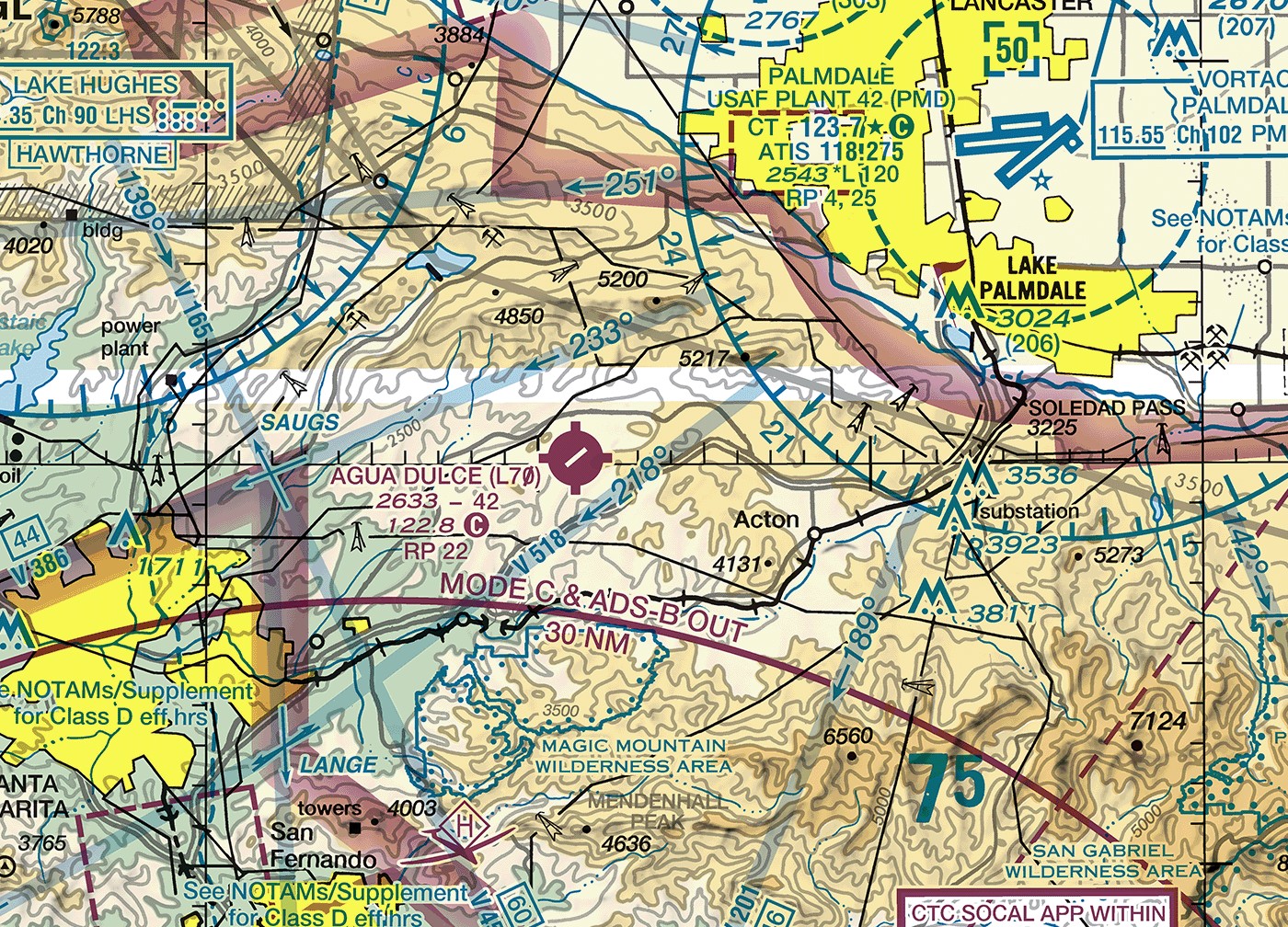 Sectional chart excerpt north of the Los Angeles Class B airspace. A thin solid magenta line curves across the excerpt with the words MODE C and ADS-B OUT 30 NM printed along it. Palmdale USAF Plant 42 lies inside a dashed Class D circle, printing green over the yellow city tint, with a 50 in a dashed ceiling box. Victor airways V386, V518, and V165 cross the area, each identifier printed in plain type beside its centerline.